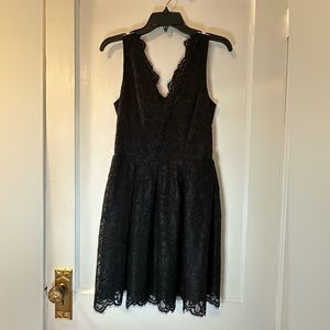 H&M Raw Edge Lace Vneck A-line Black Dress 
Size 8